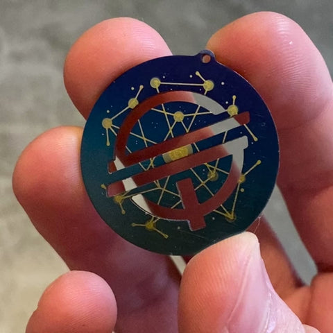Quantum Stellar Initiative | Titanium Cut Through Keychain